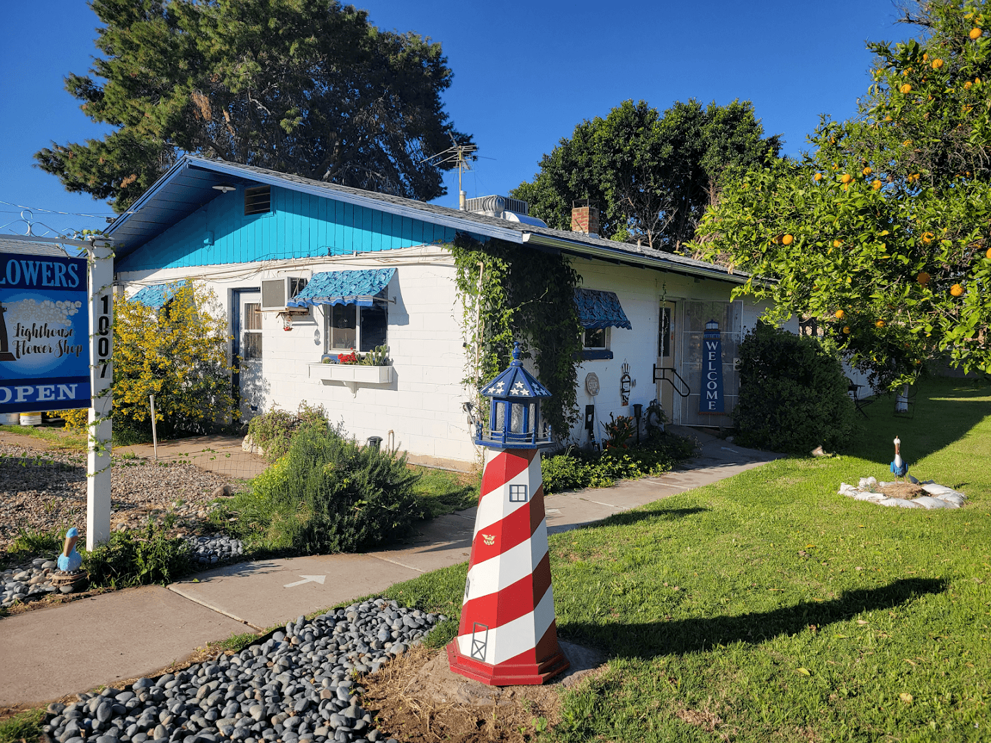 Lighthouse Flower Shop - Image 1