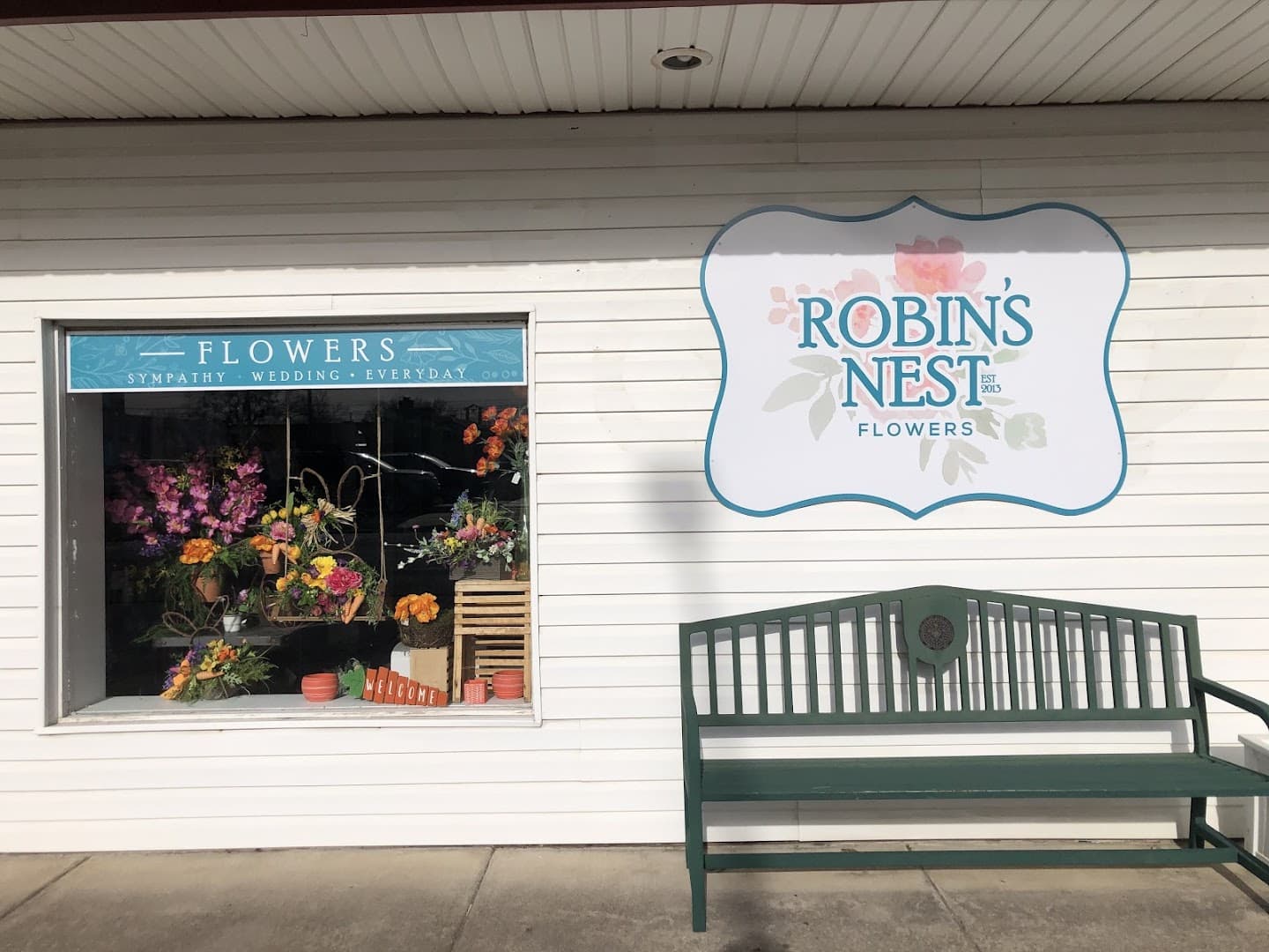 Robin's Nest Flowers - Image 1