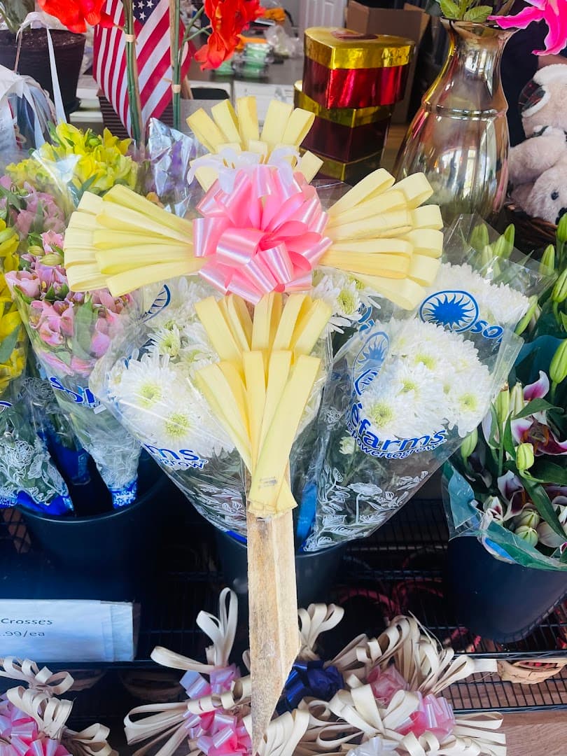 Merino's Flowers & Gourmet Fruit Baskets - Image 1